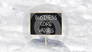 Business core values symbol. Concept words Business core values on beautiful black chalk blackboard. Beautiful snow background.