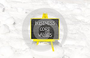 Business core values symbol. Concept words Business core values on beautiful black chalk blackboard. Beautiful snow background.
