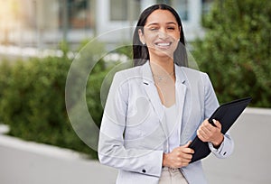 Business, corporate and finance woman worker with a happy smile outdoor on a work break. Portrait of a young financial