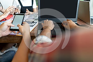 Business corporate people working with smart phone and laptop computer display technology mockup on desk table. Business team