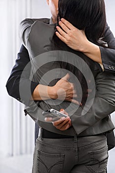 Business couple hug and kissing