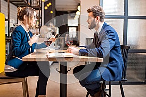 Business couple at the restaurant