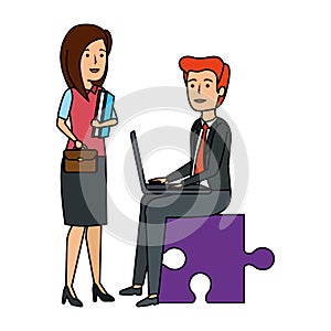 business couple sitting in puzzle piece with laptop