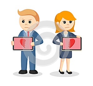Business couple standing with broken heart tablet