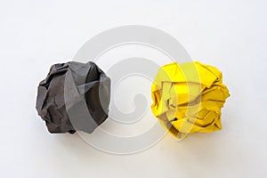 Business Creative and Idea Concept : Close up black and yellow crumpled paper isolated on white background.