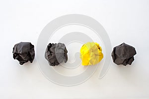 Business Creative and Idea Concept : Close up black and yellow crumpled paper on white background.