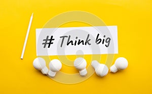 Business creativity / think big concepts with lightbulb a on yellow background