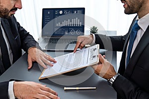 Business deal meeting, businessman reviewing terms and condition. Fervent