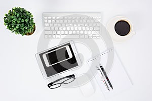 Business desk with a keyboard, mouse and pen