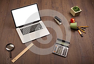 Business desk with office supplies and modern laptop white background