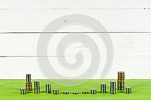 Business diagram on financial report with coins. Saving money concept.