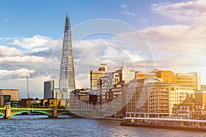 Business district with famous skyscrapers and landmarks at golden hour, London, UK