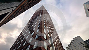 Business district with high rise office buildings panning shot at Amsterdam