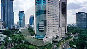 The business district of Jakarta along Jalan Sudirman, one of the city main avenue, is line with many banks HQ and other