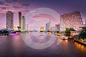 Business Downtown and Cityscape Riverside of Bangkok City at Twilight Sunset Scene, Travel Destination and Famous Place of