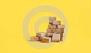 Business ecommerce or online shopping concepts with group of product box order on yellow color background