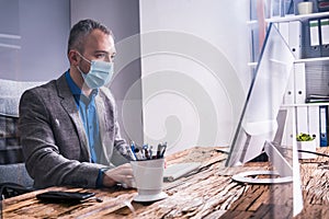 Business Employees In Office Wearing Medical Masks