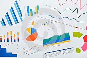 Business endpoint with reporting charts on paper