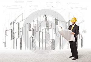 Business Engineer man with building city drawing in background