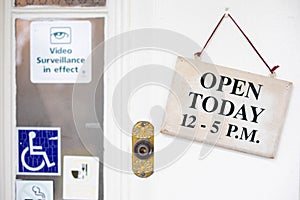 Business establishment with `Open Today` sign photo