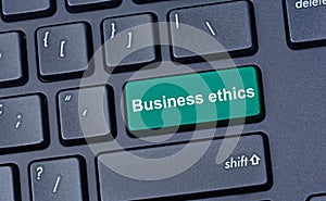 Business ethics words on computer keyboard