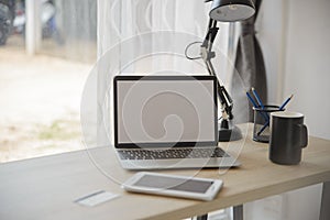 Business executive home office Desk Background concept. Business computer empty home office table with desktop mock up the laptop