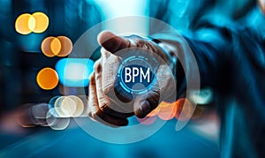 Business executive pointing to BPM Business Process Management approach to streamlining and optimizing organizational workflows photo