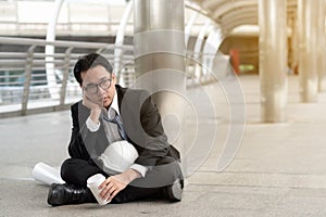 Business fail concept : businessman stressed sitting ,problem li