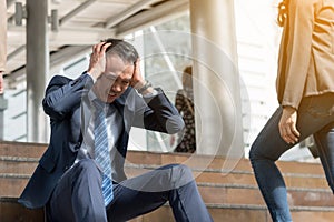 business failure concept : businessman stressed sitting ,problem life balance