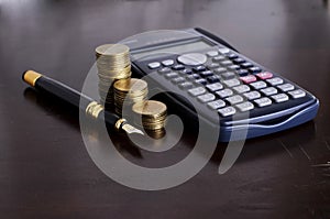 Business and Finance concept with Fountain pen and Calculator mo