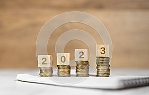 Business and finance concept. number 2023 on coins, budget on new year