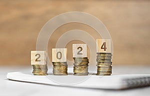 Business and finance concept. number 2024 on coins, budget on new year