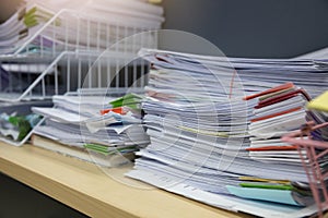 Business and finance concept of office working, Pile of unfinished documents on office desk, Stack of business paper