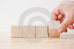 business finance. growing Profit concept,Hand arranging wood block