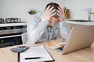 business, finances, accounting and people concept - man with money and calculator filling papers at home. savings