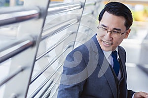 Business and financial concept Happy businessman has good vision business and get successful of business. Young asian man wear