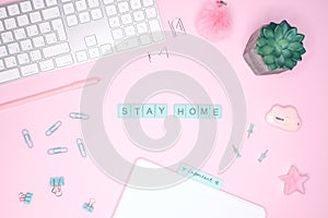 Business flat lay. Words `STAY HOME`