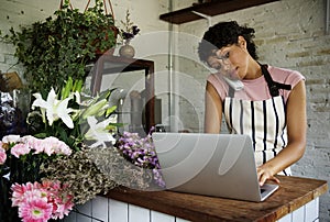 Business of flower shop with woman owner photo