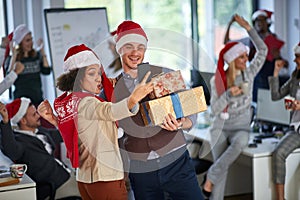 Business friends  in santa hat take  selfie at office celebration  christmas