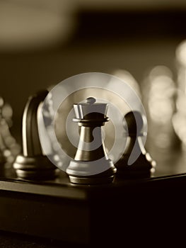 Business game competitive strategy with chess board game with blur background