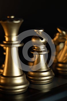 business game competitive strategy with chess board game with blur background