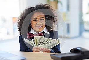 Business, girl child in office and cash, smile and glasses, education in money management or budget planning. Portrait photo