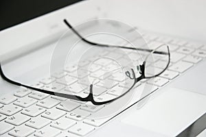 Business Glasses on the keyboard