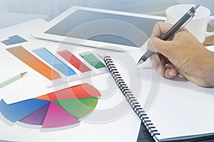 Business graph analysis with hand of a man in office meeting