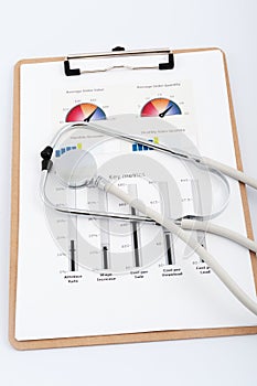 Business graph with stethoscope