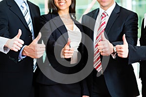 Business - group of businesspeople in office