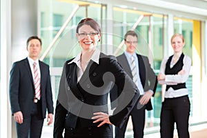 Business - group of businesspeople in office