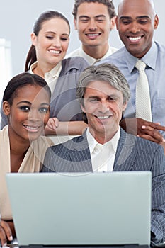 A business group showing ethnic diversity working