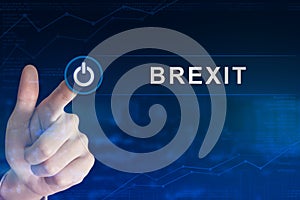 Business hand clicking brexit or british exit button