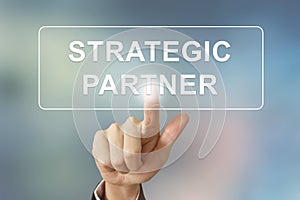 Business hand clicking strategic partner button